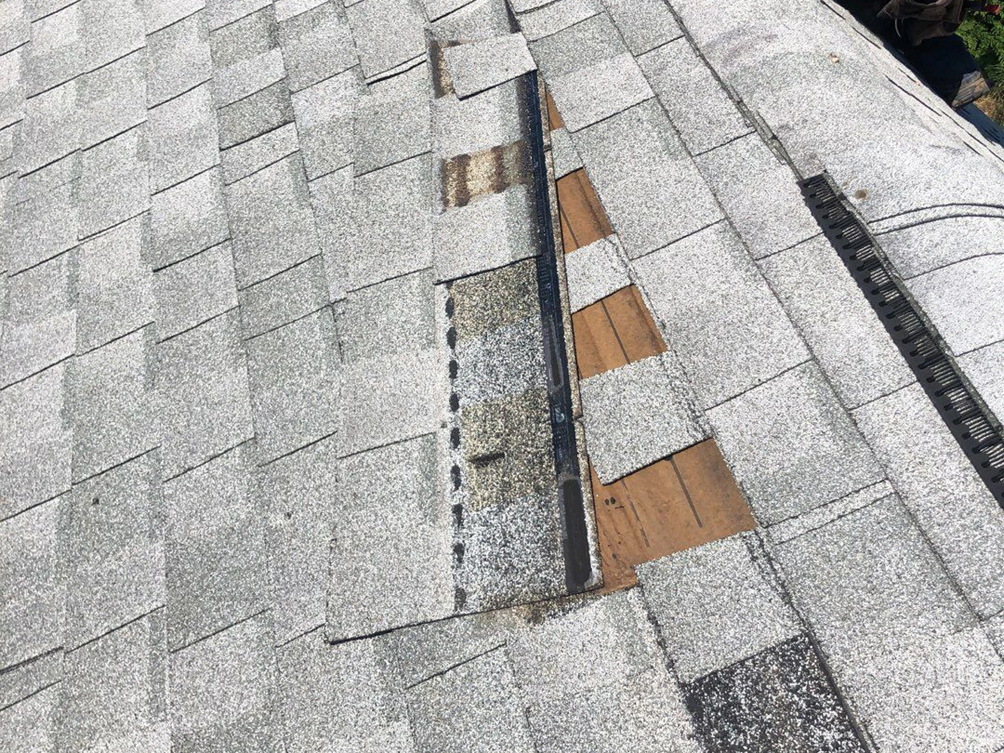 Wind Damage Found on a Residential Home in Weaverville, North Carolina. Inspection done by Quantum Roofing.
