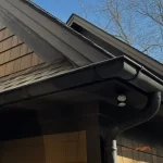 Gutter on a brown house.