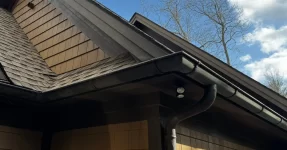 Gutter on a brown house.