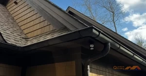 Gutter on a brown house.