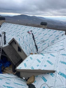 Roof replacement with mountains in the background by Quantum Roofing