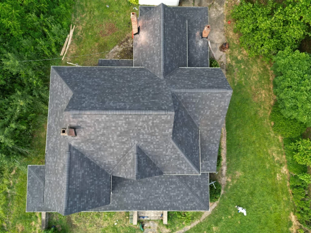 Aerial view of home in Hendersonville, NC, after a roof replacement courtesy of Quantum Roofing. 