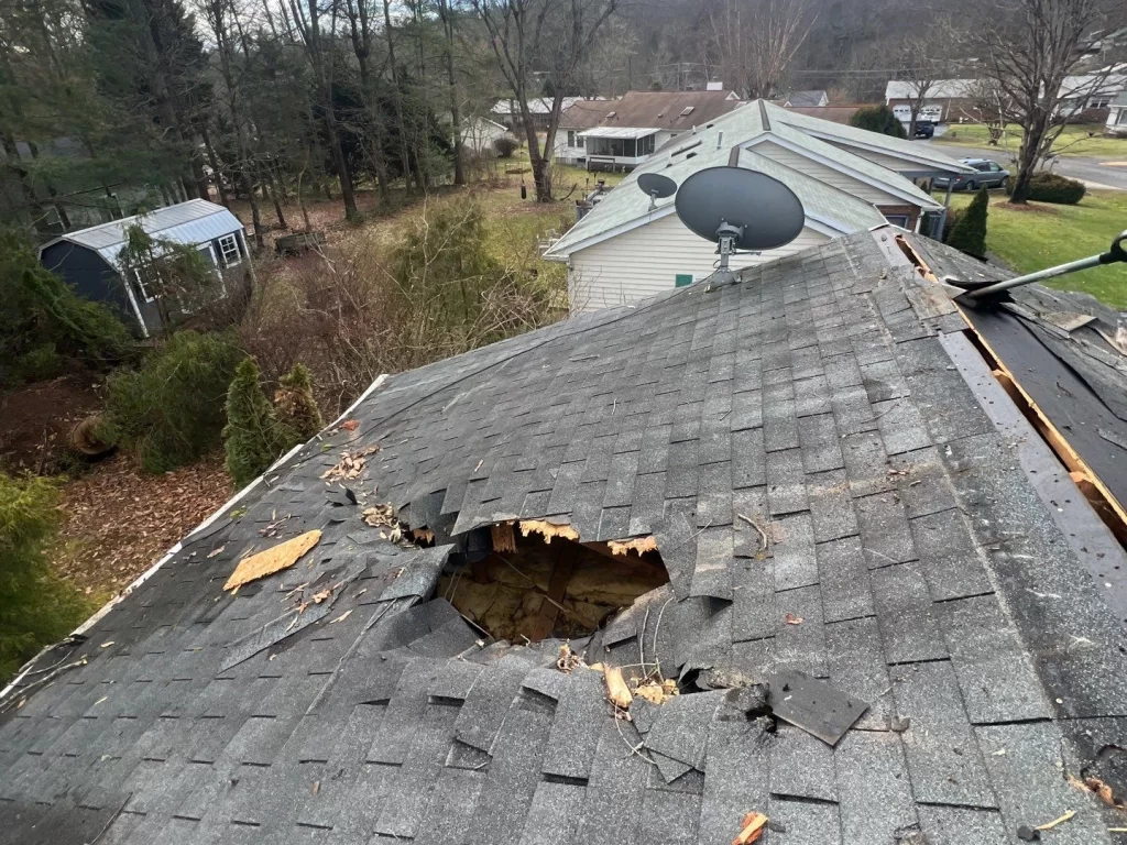 Hole In Asphalt Roof
